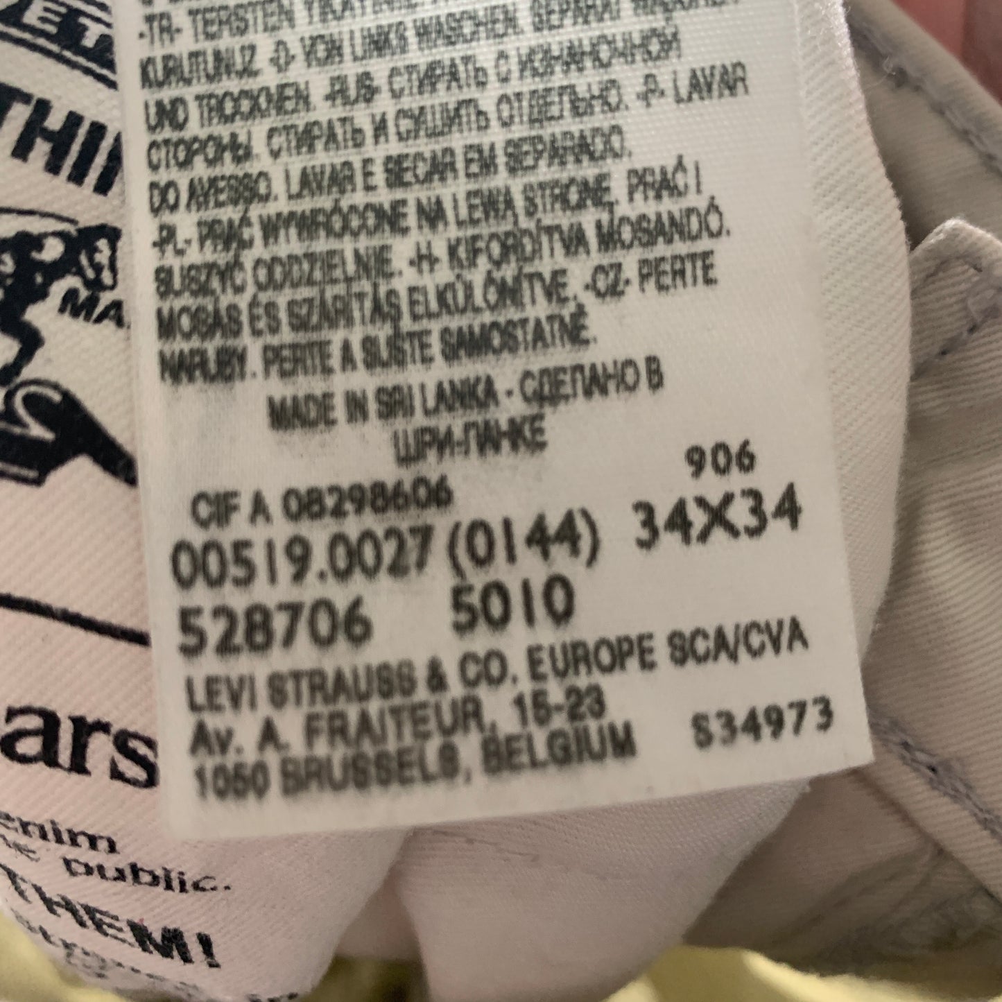 Vintage LEVI'S 519 Jeans W34 L29 Mens Slim Fit Off White