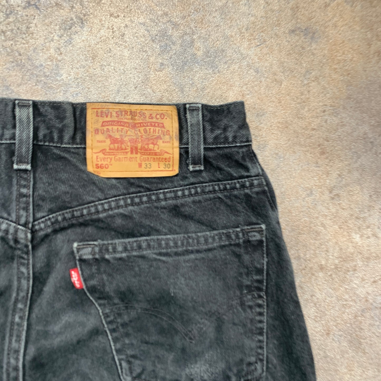 Vintage LEVI'S 560 Jeans W33 L30 Mens Relaxed Fit Tapered Grey 90s
