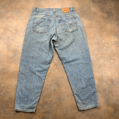 Vintage LEVI'S 560 Jeans W38 L30 Mens Relaxed Fit Tapered Blue 90s