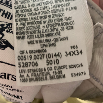 Vintage LEVI'S 519 Jeans W34 L29 Mens Slim Fit Off White