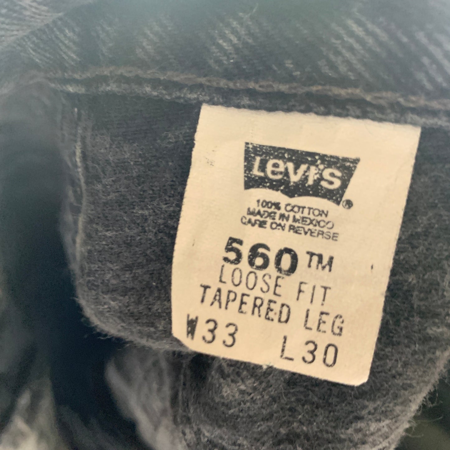 Vintage LEVI'S 560 Jeans W33 L30 Mens Relaxed Fit Tapered Grey 90s