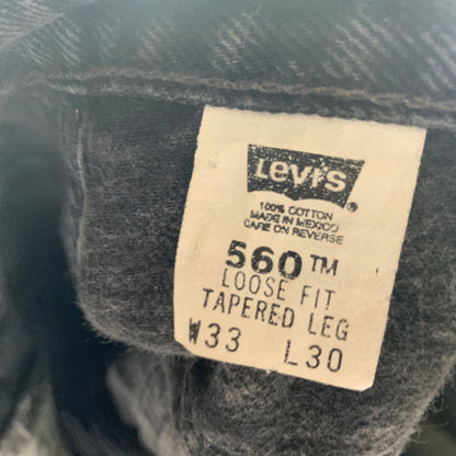 Vintage LEVI'S 560 Jeans W33 L30 Mens Relaxed Fit Tapered Grey 90s