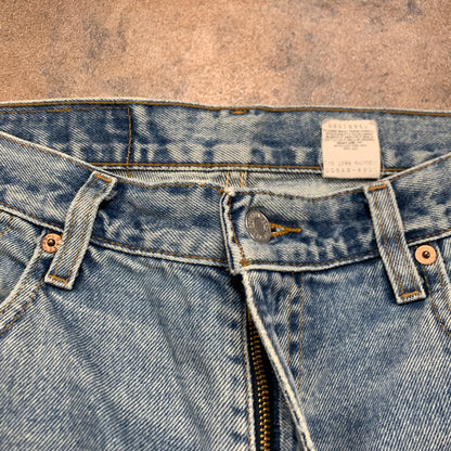 Vintage LEVI'S 560 Jeans W32 L30 Mens Relaxed Fit Tapered Blue 90s