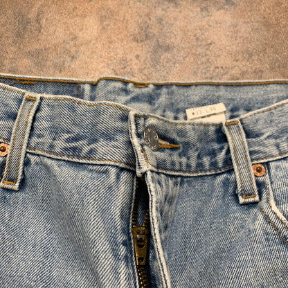 Vintage LEVI'S 560 Jeans W33 L30 Mens Relaxed Fit Tapered Blue 90s